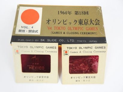 null Tokyo 1964, quatre boîtes (griffées) de diapositives officielles. Boîte 1 :...