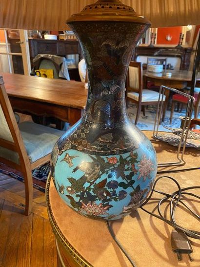 null CHINE

Vase en émaux cloisonnés à décor d’oiseaux

Vers 1900

Monté en lampe

H...