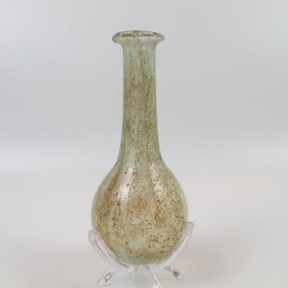 null Balsamary with spherical belly and long neck. Iridescent glass. L 10.5 cm. Roman...