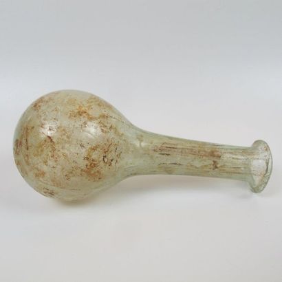 null Balsamary with spherical belly and long neck. Iridescent glass. L 10.5 cm. Roman...