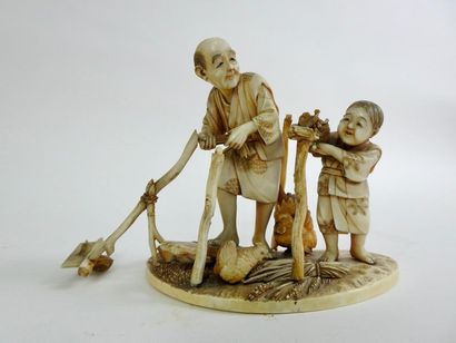 null Japon

Groupe en ivoire sculpté représentant un paysan et son enfant 

Signature...