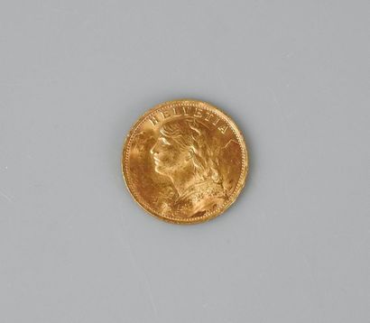 null pièces de 20 Francs suisse en or. Type Helvetia. L 1935 

Poids 6,44 g