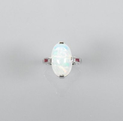 null Ring in white gold, 750 MM, set with a very beautiful black opal weighing about...