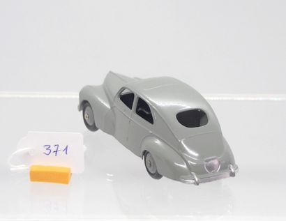 null DINKY TOYS - FRANCE - Metal (1)

# 24 R PEUGEOT 203

Small glasses. Slightly...