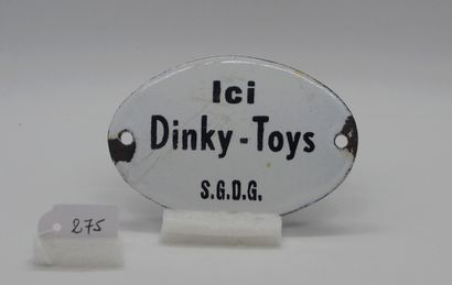  ACCESSORY - Metal (1) 
POOR CURRENT 
ENAMELED "DINKY TOYS" PLAQUE 
Small enamelled...