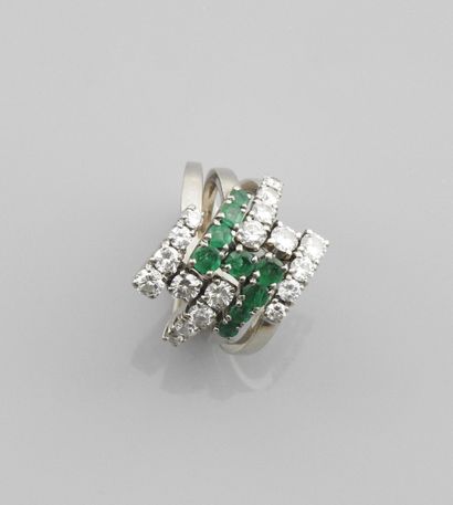 null Ring made of three two-gold V-rings, 750 MM, decorated with emeralds and diamonds,...