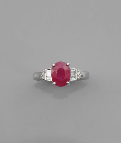 null Ring in white gold, 750 MM, set with an oval ruby weighing 2.80 carats and set...