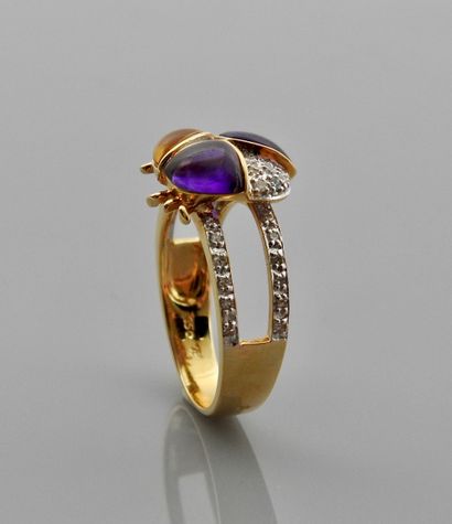 null Ring drawing a ladybird in yellow gold, 750 MM, decorated with a citrine, two...