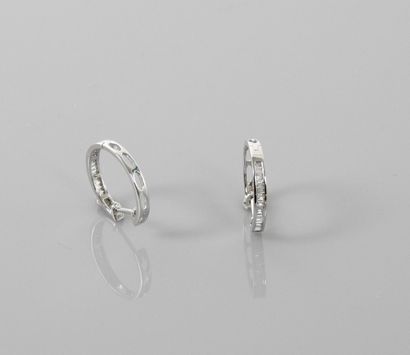 null Earrings in white gold, 750 MM, highlighted with baguette diamonds, weight:...