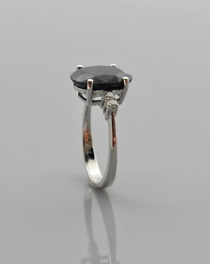 null Ring in white gold, 750 MM, set with an oval sapphire weighing approximately...