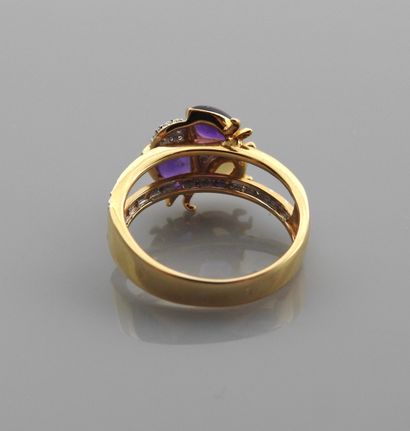 null Ring drawing a ladybird in yellow gold, 750 MM, decorated with a citrine, two...