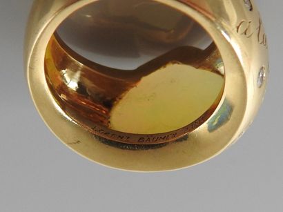 null 
LORENZ BAÜMER, Yellow gold ring, 750 MM, set with a heart cut opal "elongated...