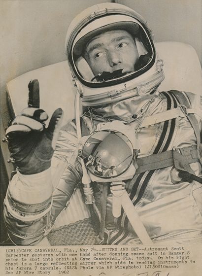 NASA NASA. Astronaut Scott Carpenter has just donned his astronaut suit before being...