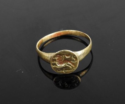 null Nice ring with a hollowed out decoration representing a lion leaping between...