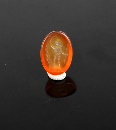 null Intaglio representing a woman holding a spear and a plant element

Zoned agate...