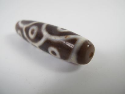 null Rare Dzi bead with 9 eyes of Buddha, protective talisman. Agate. L approx. 56mm....