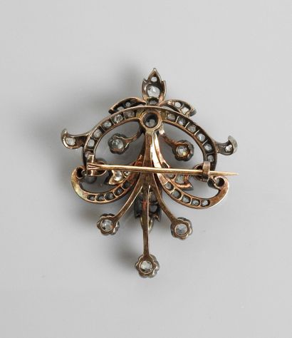 null Beautiful brooch in the shape of a lyre in gold 750MM and silver 925 MM, richly...