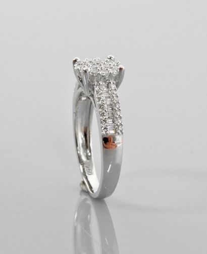 null Ring ' Ring ' in white gold, 750 MM, decorated with baguette and brilliant diamonds,...