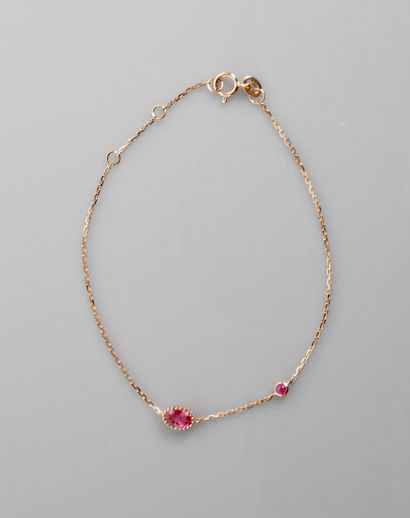 null Bracelet line in pink gold, 750 MM, punctuated with two oval pink sapphires,...