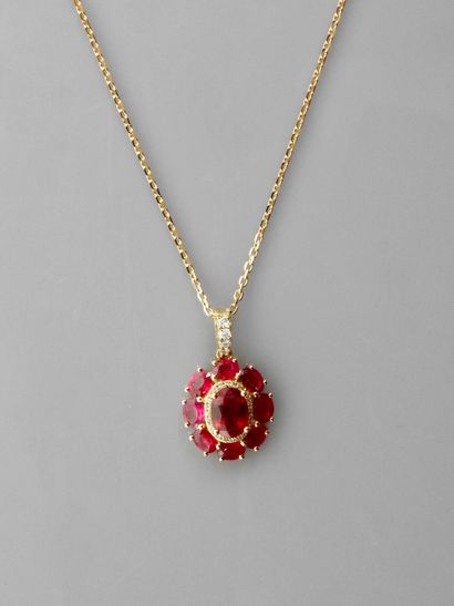 null Diamond chain and pendant in yellow gold, 750 MM, set with an oval treated ruby...