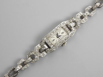 null Watchband in white gold, 750 MM, rectangular bezel surrounded and worn by diamond...