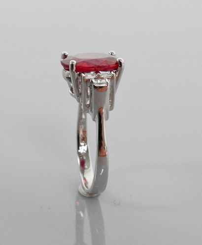 null White gold ring, 750 MM, set with a treated ruby weighing about 4 carats and...