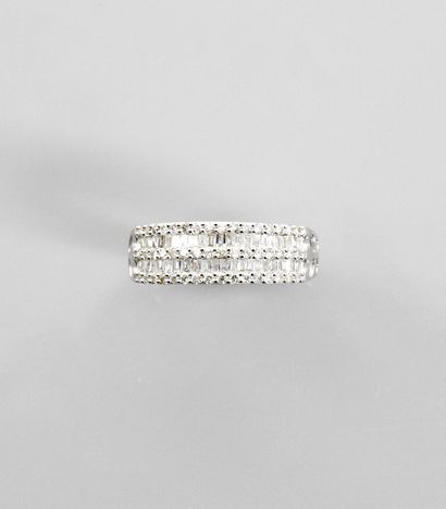 null Ring ' Ring ' in white gold, 750 MM, covered with baguette and brilliant cut...