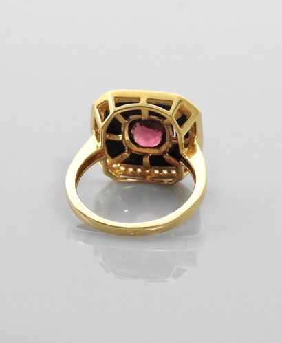 null White gold ring, 750 MM, centered on a pink tourmaline weighing 1.10 carat in...