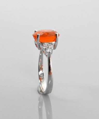 null White gold ring, 750 MM, set with an oval fire opal weighing about 2.50 carats,...