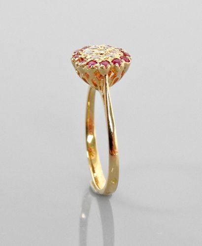 null Yellow gold ring, 750 MM, centered with diamonds hemmed with rubies, size: 47,...