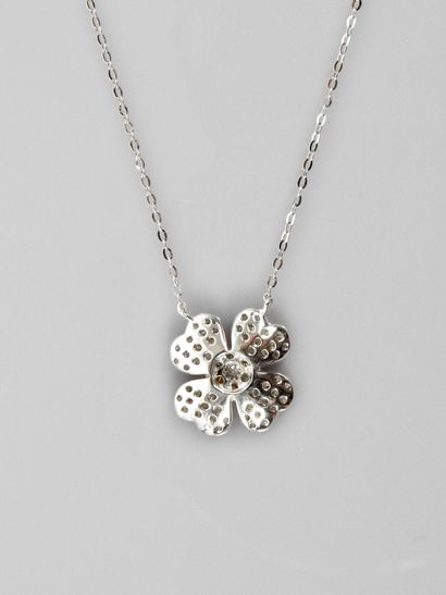 null Chain and pendant in white gold, 750 MM, drawing a flower blooming covered with...