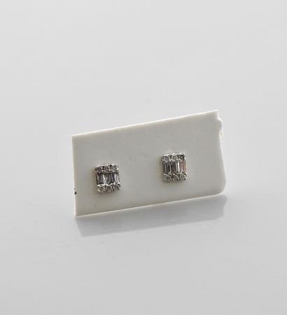 null Earrings in white gold, 750 MM, covered with baguette and brilliant cut diamonds,...