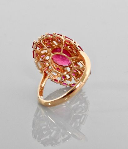 null Ring drawing an oval tray in pink gold, 750 MM, centered with a ruby weighing...