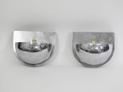 null 
Louis Poulsen,




Pair of Paquebot half-moon sconces in chromed steel with...