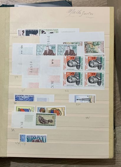 null 2 Albums Stamps ND ex-French colonies including Madagascar, Guinea, Algeria....