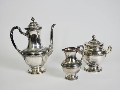 null A three-piece silver-plated tea service with crossed ribbons

Provenance Hotel...