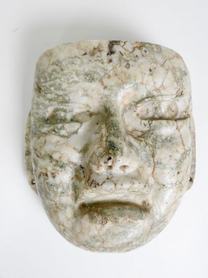 null Masque de style Olmèque

Pierre sculptée

H 16 cm