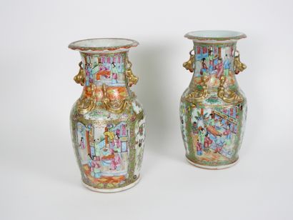 null China

Pair of porcelain and enamel vases of the pink family

Handles in appliques...