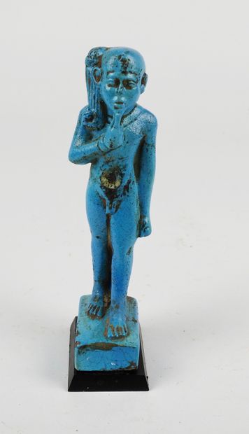 null Statuette of the God Harpocrates walking.

Glazed frit, Low Period style.

H...