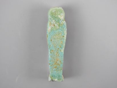 null Oushebti en fritte turquoise anépigraphe.Epoque ptolémaïque.335-32 av J.C.