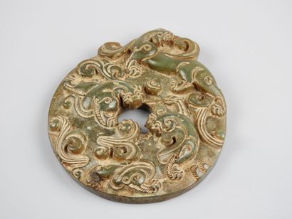 null Bi disc with dragons.

Nephrite jade.fine old work.probably Ming or Qing period.l...