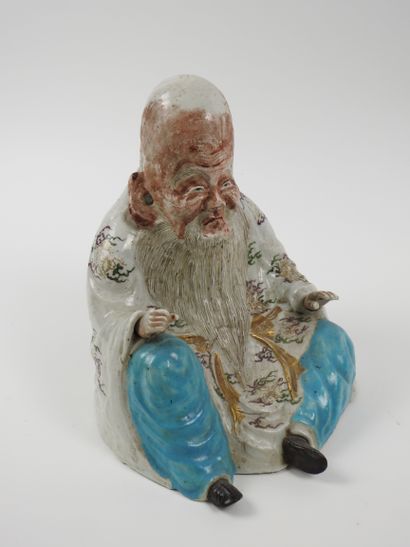 null Sage assis composite de

Chine.Porcelaine polychrome peinte.En l’état.Usures.

H...