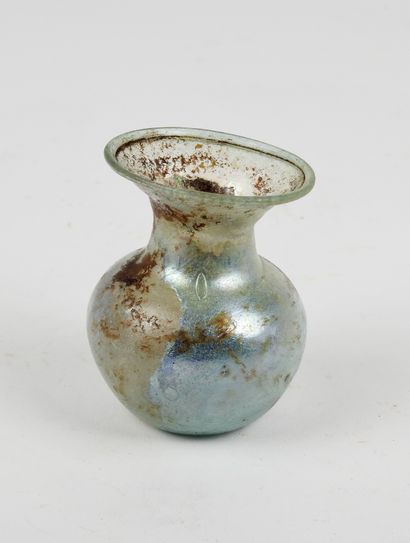 null A globular arybubble, blue iridescent glass, 6,5cm high, as is.

Roman period.ca...