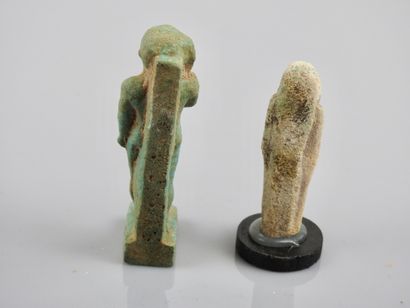 null Two amulets including God

Harpocrates and oushebti, frit or glass paste, Low...