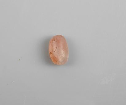 null Seal bead engraved with an ungulate.pink chalcedony.in the state of natural...