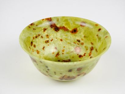 null A jade or serpentine spotted green stone bowl.

China.XIX-XXth century.

D :approx...