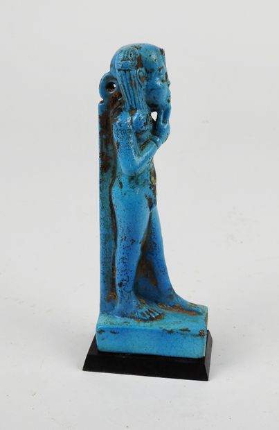 null Statuette of the God Harpocrates walking.

Glazed frit, Low Period style.

H...