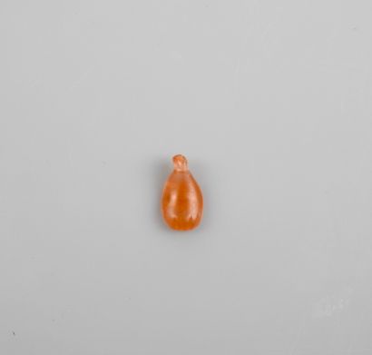 null Fine amulet seal bead engraved with an ungulate.semi-transparent pink agate.small...