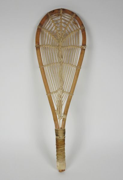 null Tennis racket. Xare racket (or "Argentine racket") in light wood, beige stringing,...