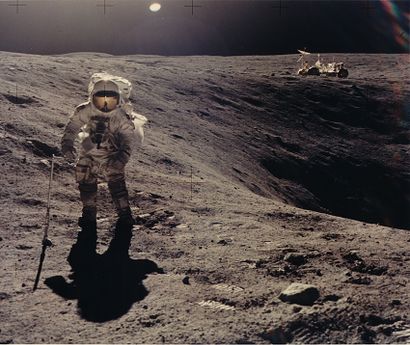 null NASA. Apollo 16 mission. Lunar Module Pilot Charles M. Duke is pictured collecting...